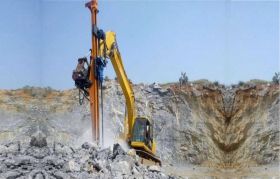 Máy khoan đá lắp trên xe đào
